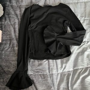 Anthropologie Black top with fun sleeves!